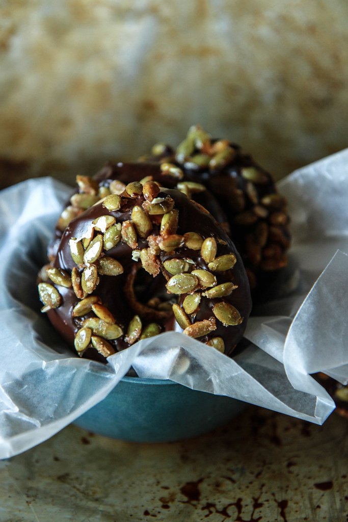 Pumpkin Ginger Donuts with Chocolate Ganache and Candied Pepitas- Vegan and Gluten Free