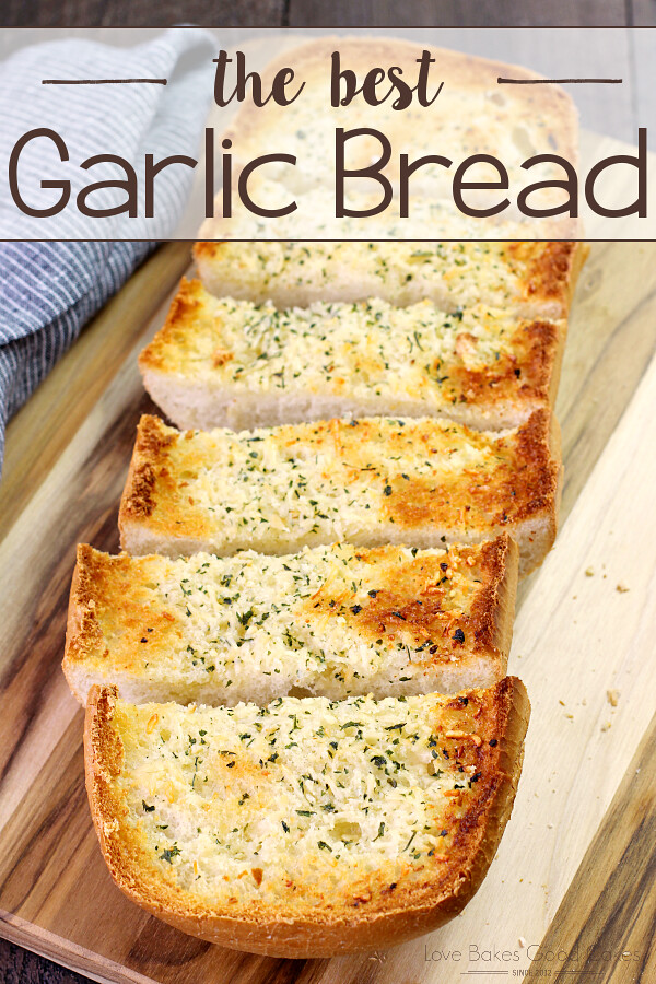 BEST Garlic Bread sliced on a cutting board.