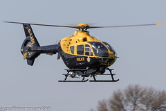 G-LASU - 2002 build Eurocopter EC135 T2+, departing down Runway 08 at Barton