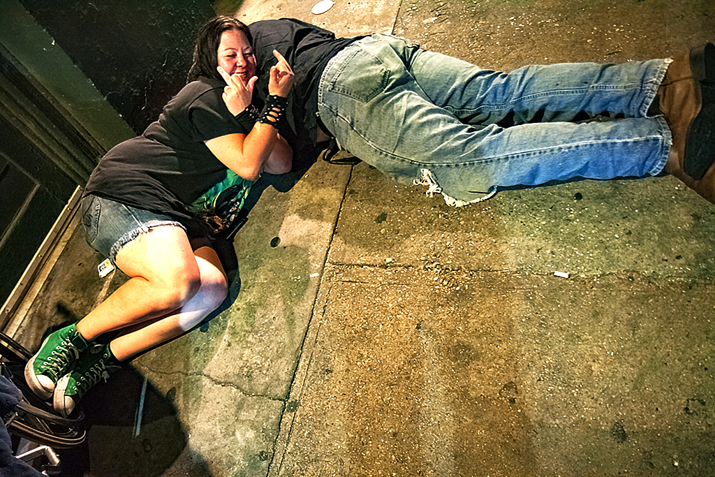 Couple-on-ground-on-N-Rampart-St--New-Orleans
