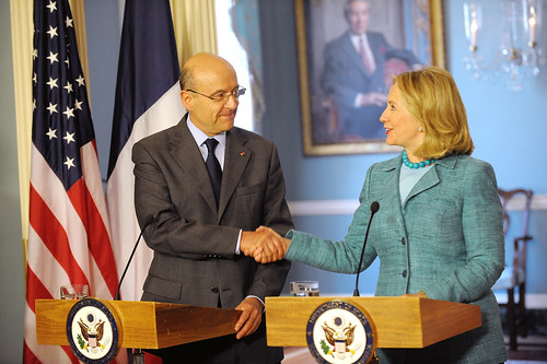 Secretary Clinton Shakes Hands With French Foreign Minister Juppe