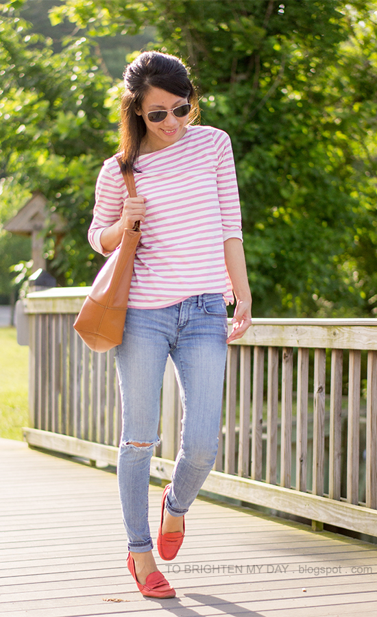 pink and white striped top, light wash jeans, red loafers, cognac brown tote