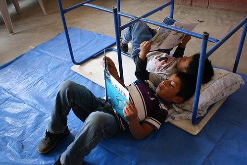 Boys reading at El Caman