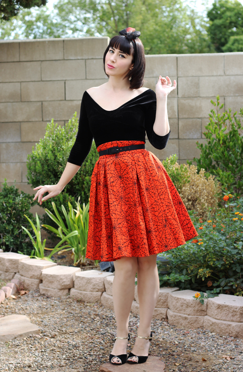 Pinup Couture Lolita Top in Black Velvet Laura Byrnes California Little Jun Skirt in Orange with Black Spider Web