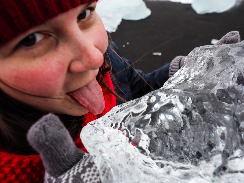 Amanda licking glacier ice in Iceland