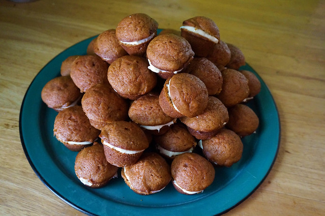 A veritable mountain of 4 dozen mini-muffins, cream cheese slathered within each, all in a big mound on a turquoise platter