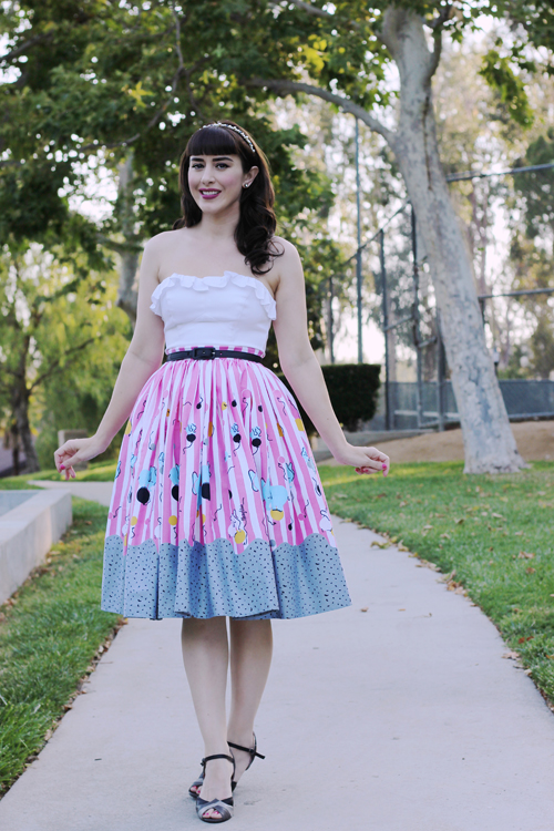 Pinup Girl Clothing Pinup Couture Jenny Skirt in Mary Blair Circus Elephant Print Dixiefried Bustier Top in White Sateen