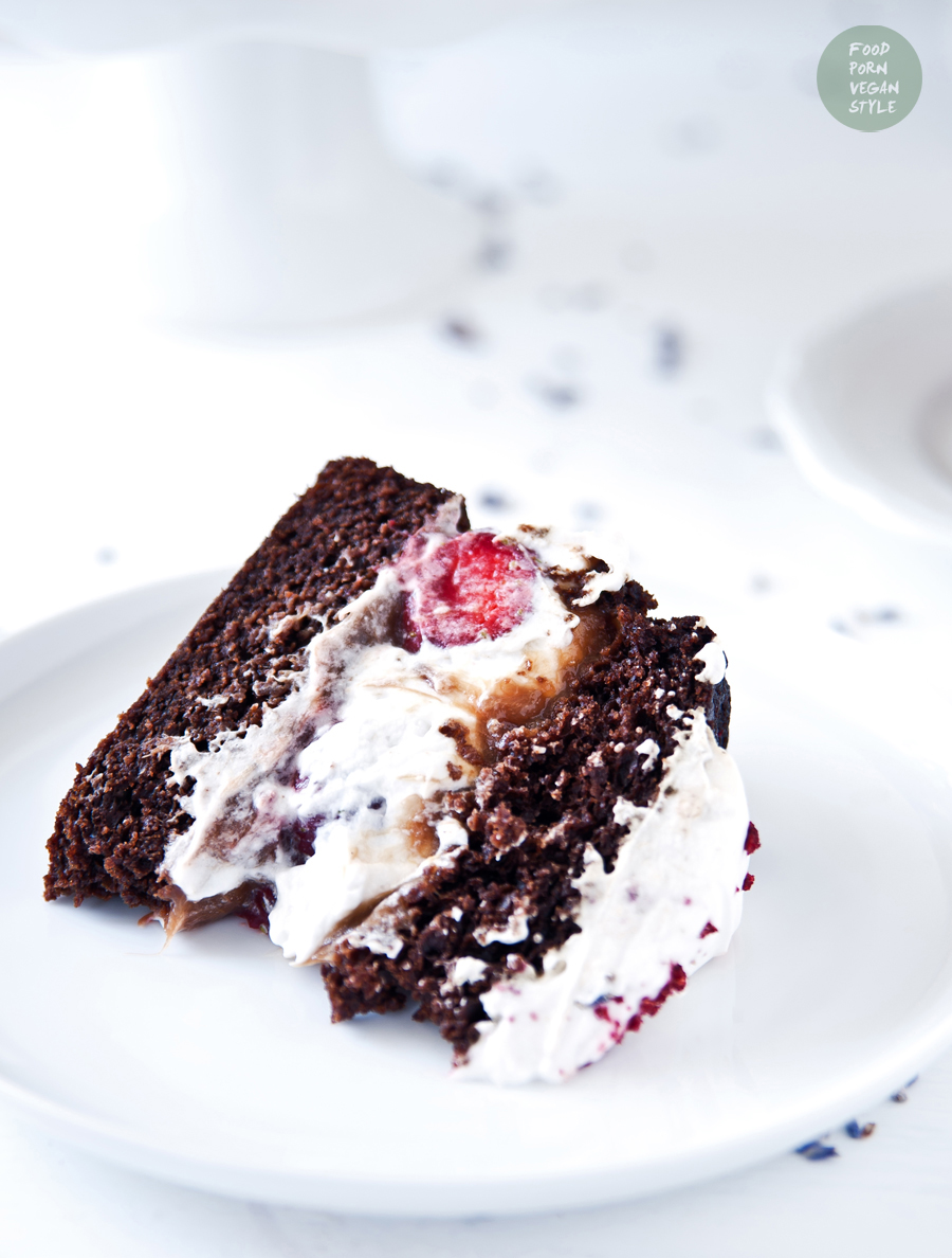 Vegan carob layer cake (tort) with coconut whipped cream, strawberries and rhubarb