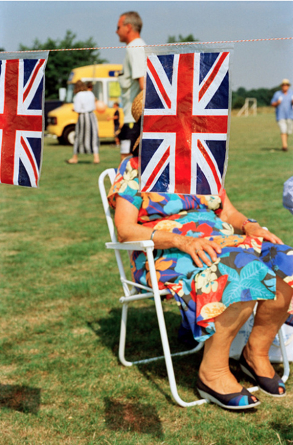 16f25 GB. England. Sedlescombe. British flags at a fair. 1995-1999. Think of England, 2000 Uti 425