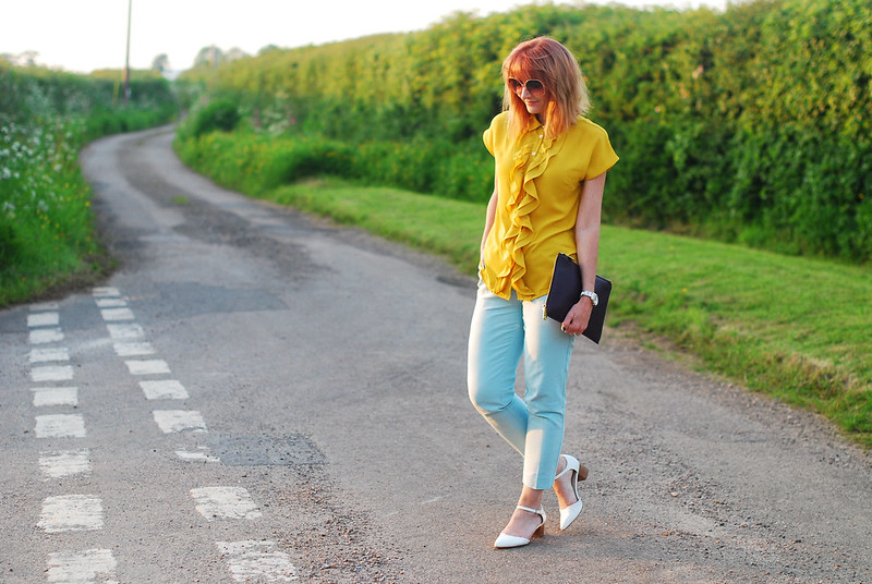 Summer brights: Ruffled yellow blouse, mint trousers, low pointed white heels, Jennifer Hamley Model KT Workbag clutch, oversized 70s sunglasses | Not Dressed As Lamb