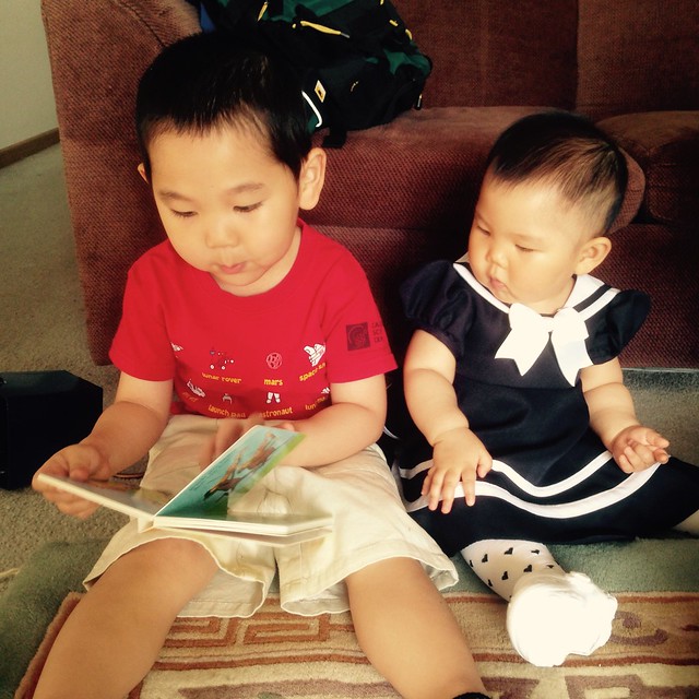 Reading Dr Seuss for his baby sister