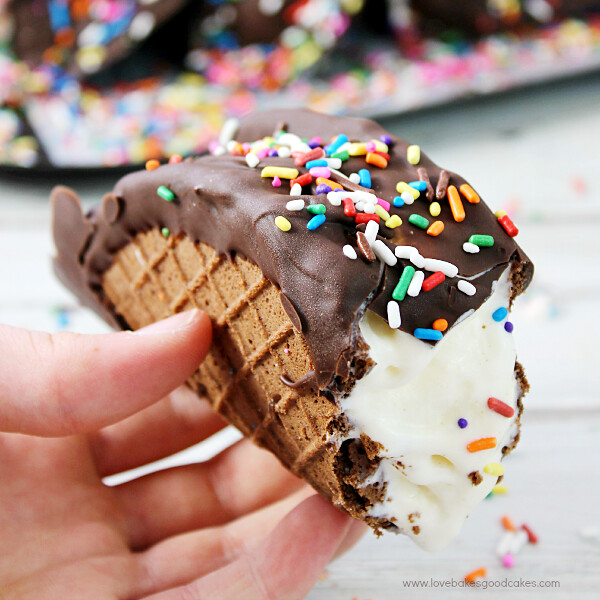 Choco-Taco in hand with rainbow sprinkles.