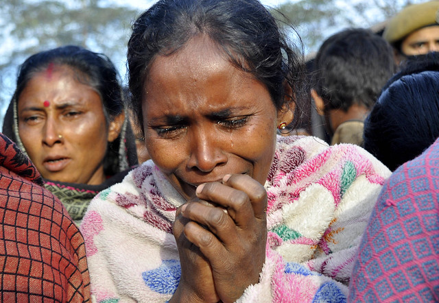 An inmates breaks down in relief camp after violence in BTAD