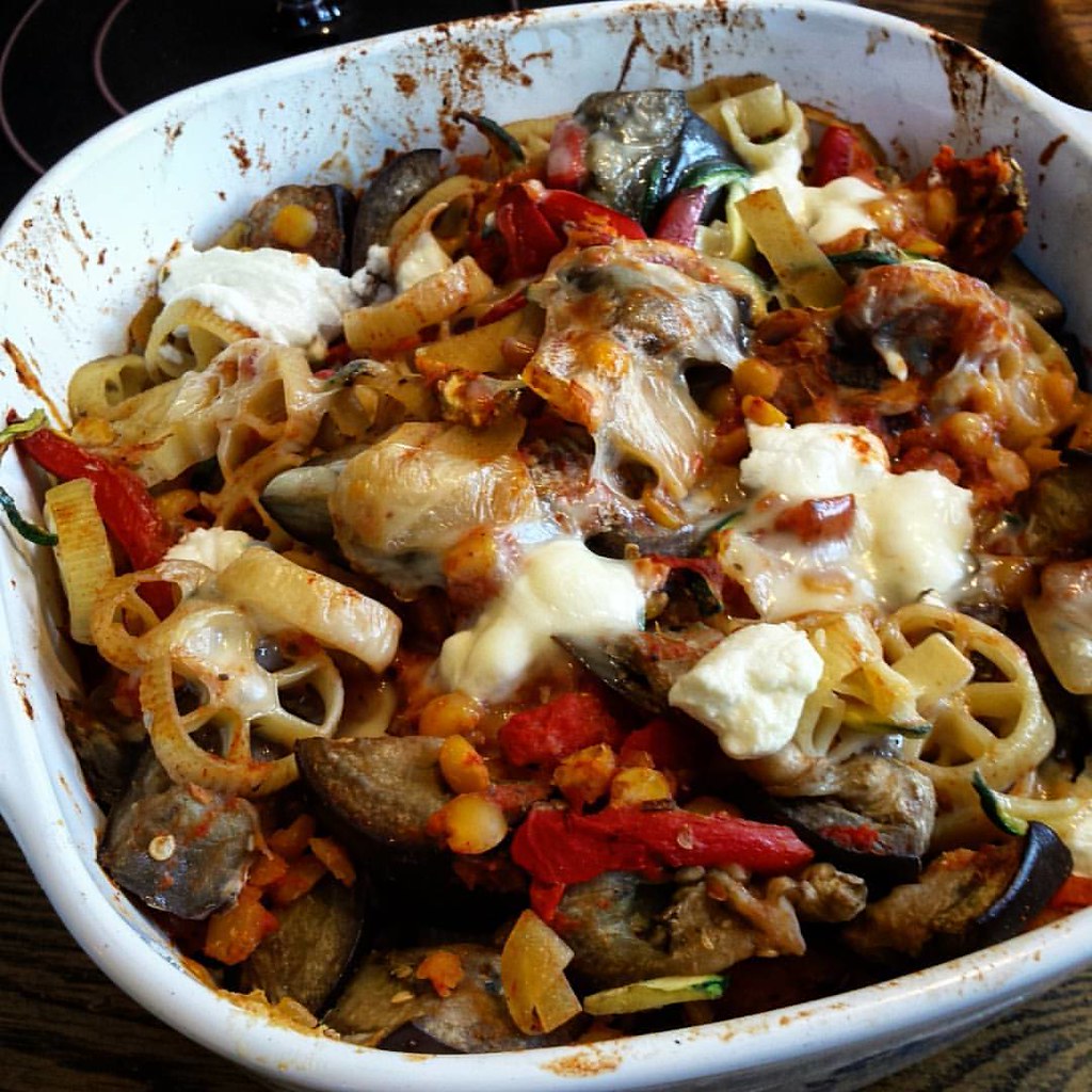 Pictures don't do this Pasta-touille justice. TONS of #vegetables, split peas and a teeny bit of #chicken, laced with goat and fresh mozzarella #cheese ! #yum #food #cooking #baked #SundaySupper #tomatoes #foodie #dinner