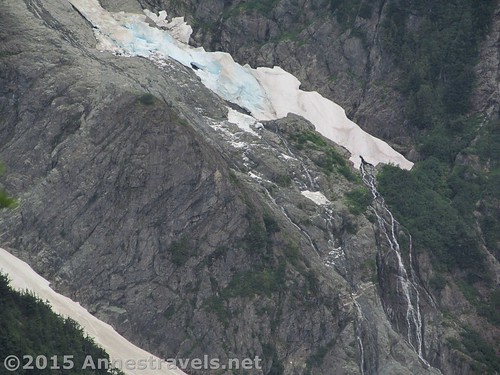 On the way down, we all heard the gunshot-like snap as an avalanche fell from this glacier. You can see the snow debris left behind all over the bare rock. Cascade Pass, North Cascades National Park, Washington