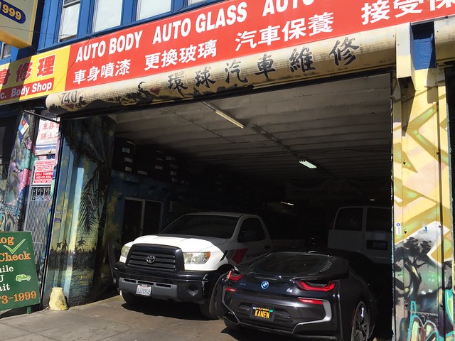 BMW i8 at a Chinese bodyshop in Tenderloin