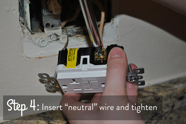 Insert neutral wire and tighten