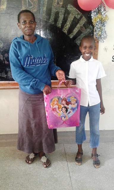 Jane wanjiku receiving her present