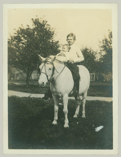 Two children on a horse