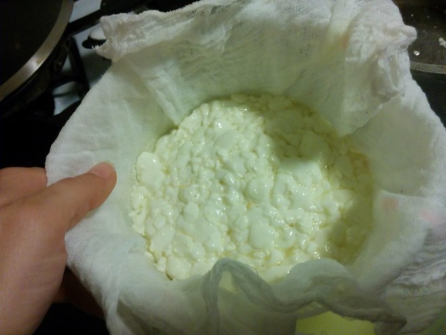 Straining out whey from curds