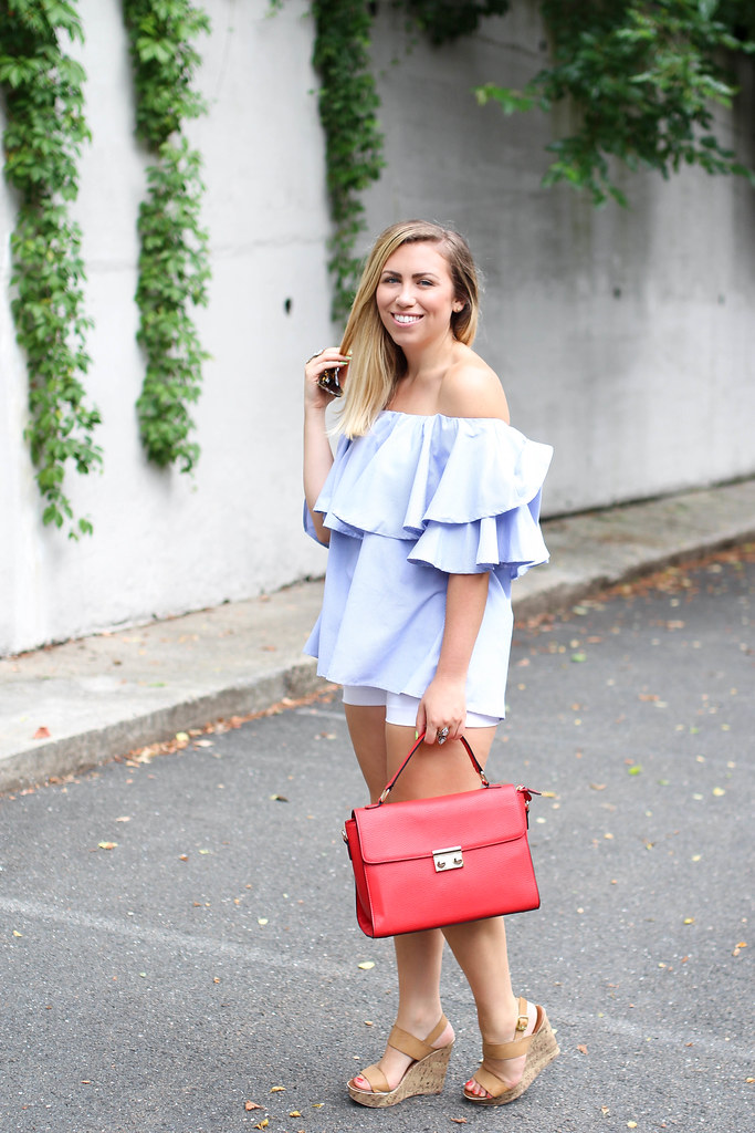 SheIn Blue Ruffle Off The Shoulder Blouse White Shorts Nude Wedge Sandals Galian Red Handbag Easy Casual Summer Outfit Living After Midnite Blogger Jackie Giardina