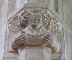 Methwold, Norfolk, St George, angel in arcade with a scroll