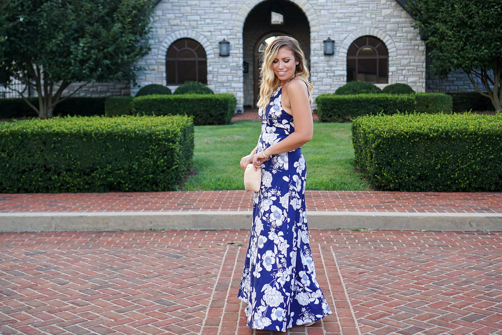 woman in blue floral dress